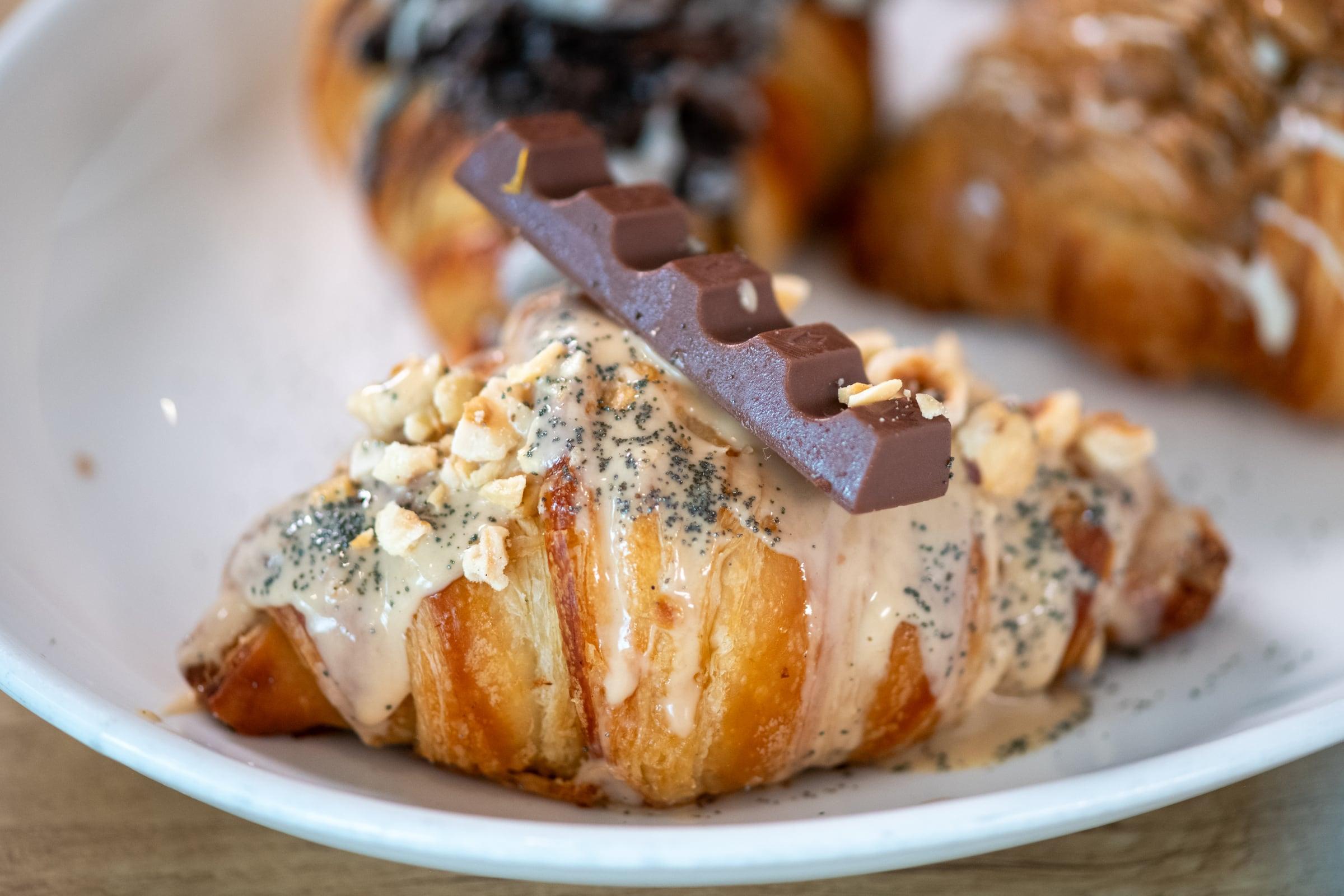 Chocolate croissant finished with cream and chocolate at Roast-n-Toast